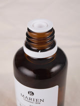 マリエンの授乳期オイル、母乳育児のための乳房保護とケア用マッサージオイル。ボトルトップ。